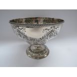 A Fenton Brothers Ltd silver footed rose bowl decorated with floral swags, gadrooned border,