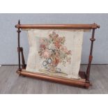 Circa 1840 a mahogany tapestry needlepoint work stand with lidded thread box base