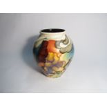 A Moorcroft Guardian Angel pattern vase from The Circle of Life Series, designed by Emma Bossons,