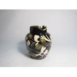 A Moorcroft Japanese Honeysuckle pattern ginger jar, designed by Kerry Goodwin, 15cm tall,