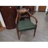 A 19th Century mahogany open-arm dining chair