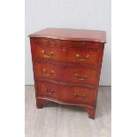 A George III style crossbanded mahogany serpentine front chest of small proportions the brushing