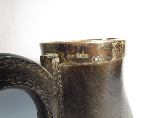 A Jacob & Ross of Winchester black leather jug with silver rim, Sheffield 1904, - Image 3 of 3