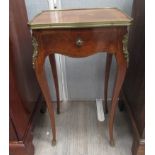 A late 19th Century French Kingwood lady's slim dressing table with cabriole legs,