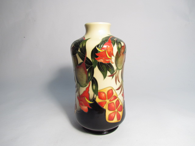 A Moorcroft Trial vase designed by Vicky Lovatt with fruit and flower design, marked Trial 7/1/13,