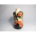 A Moorcroft Trial vase designed by Vicky Lovatt with fruit and flower design, marked Trial 7/1/13,
