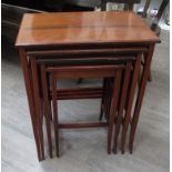 A quartet of mahogany tables with chequered line inlay to top,