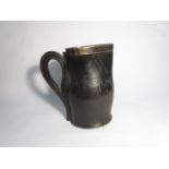 A Jacob & Ross of Winchester black leather jug with silver rim, Sheffield 1904,