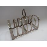 An Emile Viner seven bar silver toast rack, Sheffield 1951,