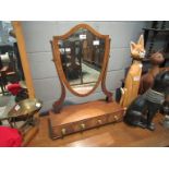 An Edwardian mahogany shield back dressing table mirror