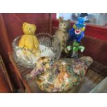 A pottery cat, figure of a duck, Murano clown,