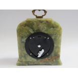 A green onyx timepiece with Elliott movement, retailed by Thwaites & Reed, London,