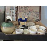 A box of assorted items including Delft, Royal mugs,