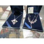Two cased Swarovski element necklaces including set with matching earrings