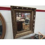 A 19th Century gilt gesso framed wall mirror with pierced surround,