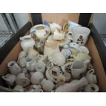 A collection of crested ware including Norwich canary and Child's tea set