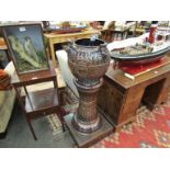 A 19th Century French glazed jardiniere on stand with lion mask details,