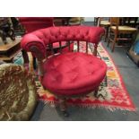 A Victorian spindle back tub chair with red velour upholstery
