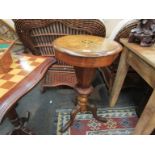 A Victorian walnut sewing box table, marquetry top,