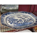 An 18th Century Chinese blue and white platter, badly damaged,