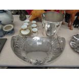 A silver plated champagne ice bucket, tray, pair of toast racks and dish,