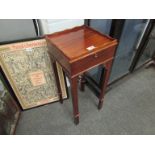 A George III mahogany tea urn table, 69cm x 28.5cm x 28.