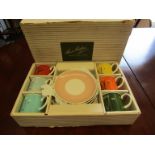 A boxed Susie Cooper teaset comprising of six cups and eight saucers