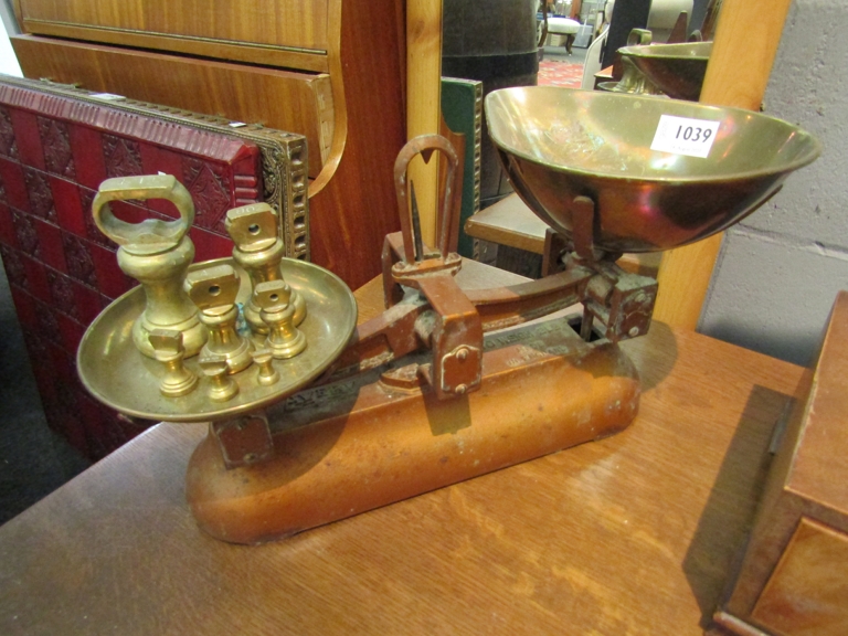 A set of brass scales and weights