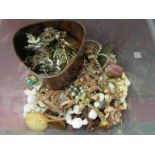 A tub of costume jewellery including necklaces,