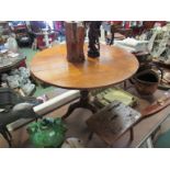 A George III oak tilt top tripod breakfast table,