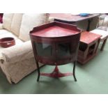 A 19th Century mahogany bow front corner washstand the two glazed doors over a single central