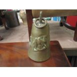 A heavy brass camel bell