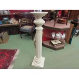 A painted fluted torchere,