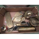 A collection of brass items including cribbage board, crumb scoop and brush,