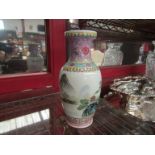 A 20th Century Chinese porcelain vase decorated with mountain temple design,