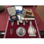 A silver plated communion set, cased, a silver key, coins,