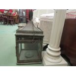 A decorative tin lantern, pierced rim,