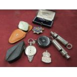 Police/ARP whistles and silver badges, tape measure,