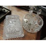 A cut glass cheese dish, bowl, oil and vinegar bottles,