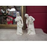 A pair of Royal Worcester cream glaze figure "New Arrival" and "First Steps"