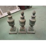 Three cast brass finials