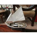 A Cutty Sark model ship,