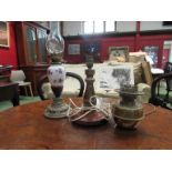 A brass oil lamp converted to electrical,