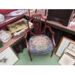 A 19th Century Hepplewhite design mahogany elbow chair with carved and reeded decoration the shield