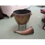 A horn and brass vessel and a free standing brass coal bucket with ring turned and lions head