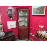 A 19th Century mahogany corner cabinet with inlay and glazed door, cornice a/f,