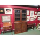 A Victorian mahogany glazed bookcase over cupboard base,