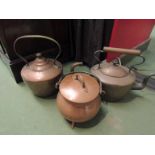 Two copper kettles and a miniature copper cauldron (3)