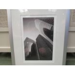 A limited edition print depicting city buildings, No.
