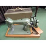 A Jones cased sewing machine